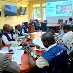 TFELTP Cohort 18 residents and their mentors conducting document reviews, interviews, and orientation sessions on the 7-1-7 framework at Nkasi District Council, Rukwa Region.