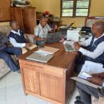 TFELTP Cohort 18 residents and their mentors conducting document reviews, interviews, and orientation sessions on the 7-1-7 framework at Nkasi District Council, Rukwa Region.