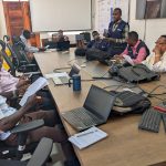 TFELTP Cohort 18 residents conducting an orientation session on the 7-1-7 framework for the Kigoma Regional Health Management Team.