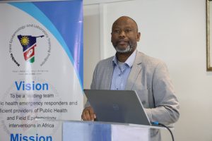 Mr. Johannes Gasesb, Acting Executive Director in the Ministry of Health and Social Services making remarks at the Namibia Frontline One Health Training Program Cohort IX graduation on 15 May 2026