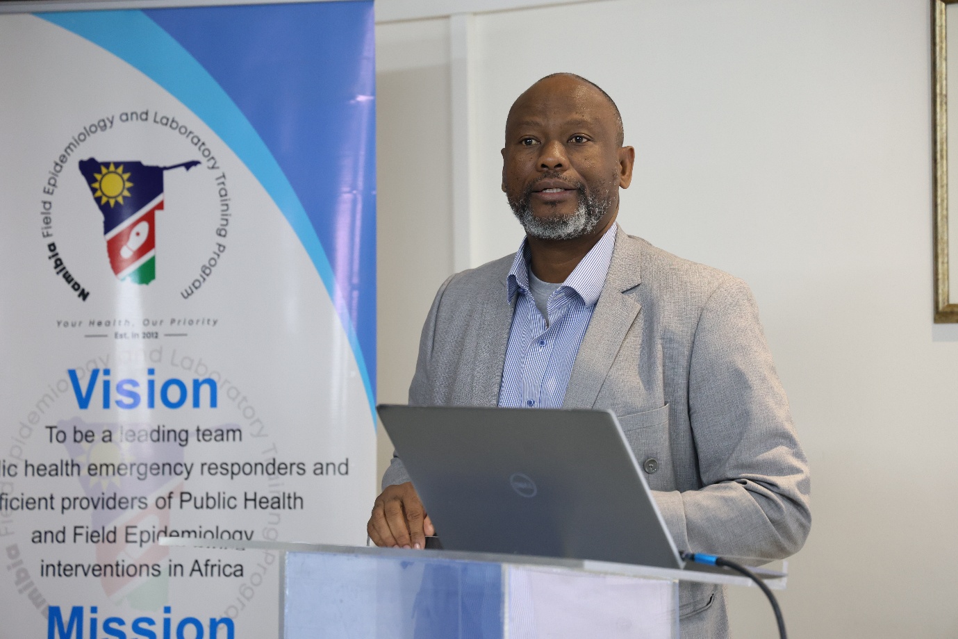 Mr. Johannes Gasesb, Acting Executive Director in the Ministry of Health and Social Services making remarks at the Namibia Frontline One Health Training Program Cohort IX graduation on 15 May 2026
